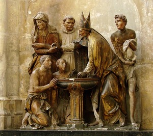 Baptism of St Augustine of Hippo relief.jpg